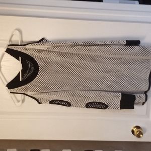 Love and Legend plus size knitted sweater with exposing sleeves.